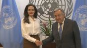 Angelina NATO UN handshake